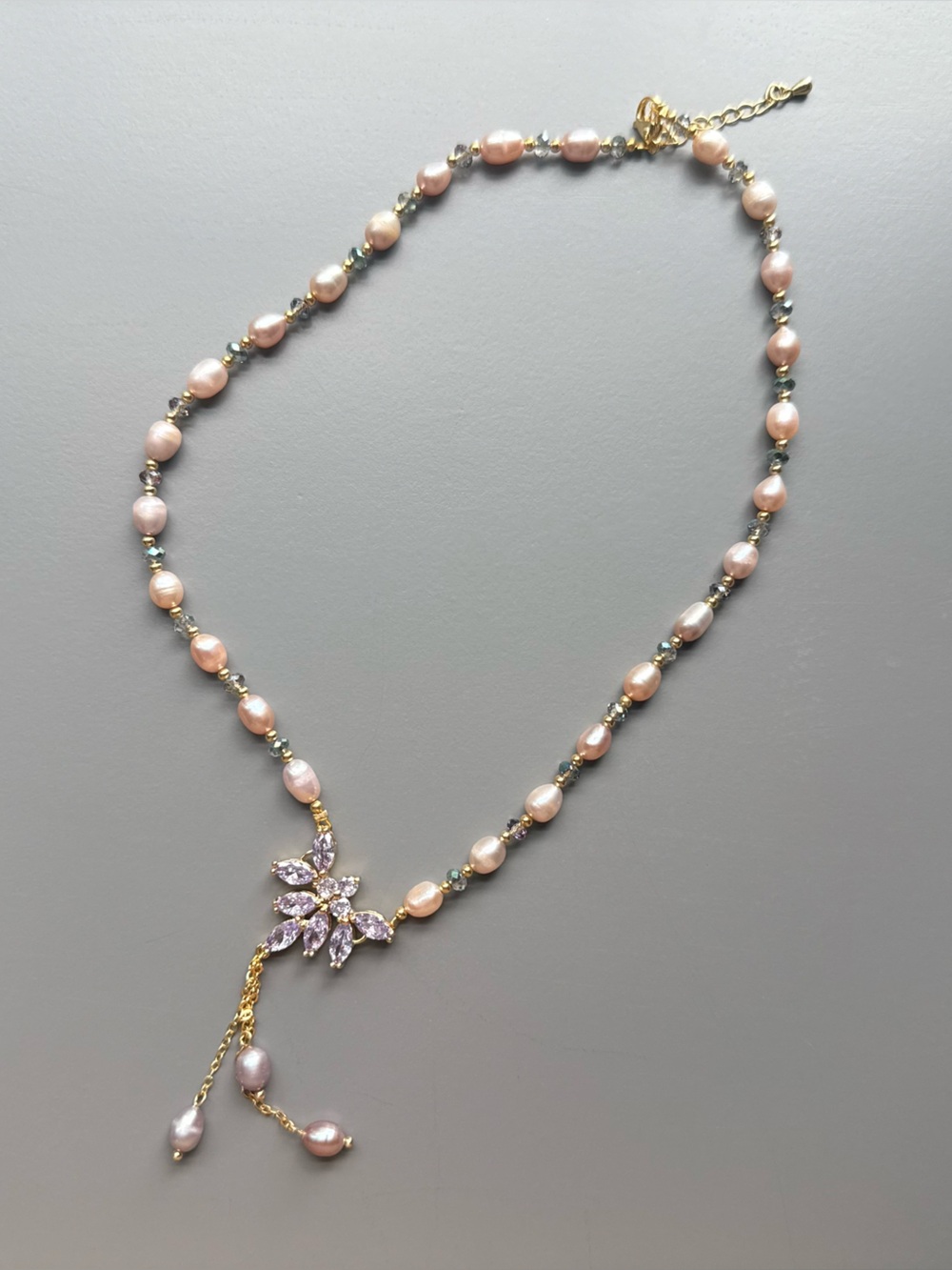 Delicate Pink Pearl Necklace with Purple Crystal Flower Accent